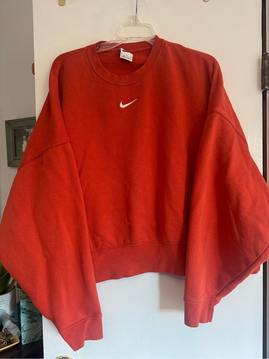 Nike Tops - Nike Women’s Orange Crew Sweatshirt with White Swoosh